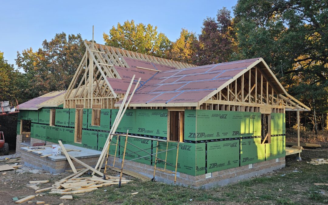 House under construction with wooden frame