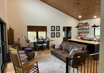 Cozy open-concept living and dining area with kitchen.