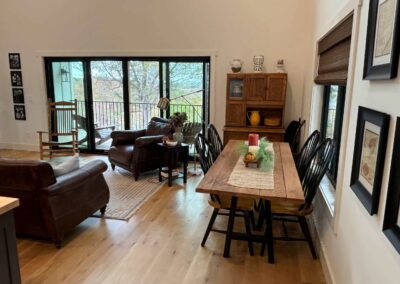 Cozy living room with dining area and balcony view.